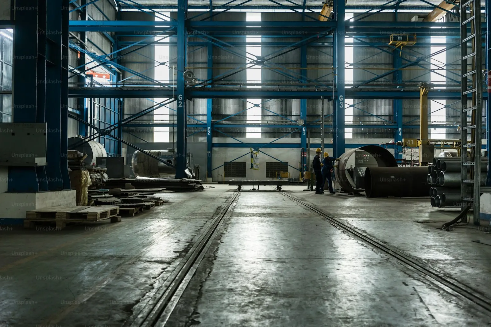 Manufacturing operator reviewing job cost and margin reports