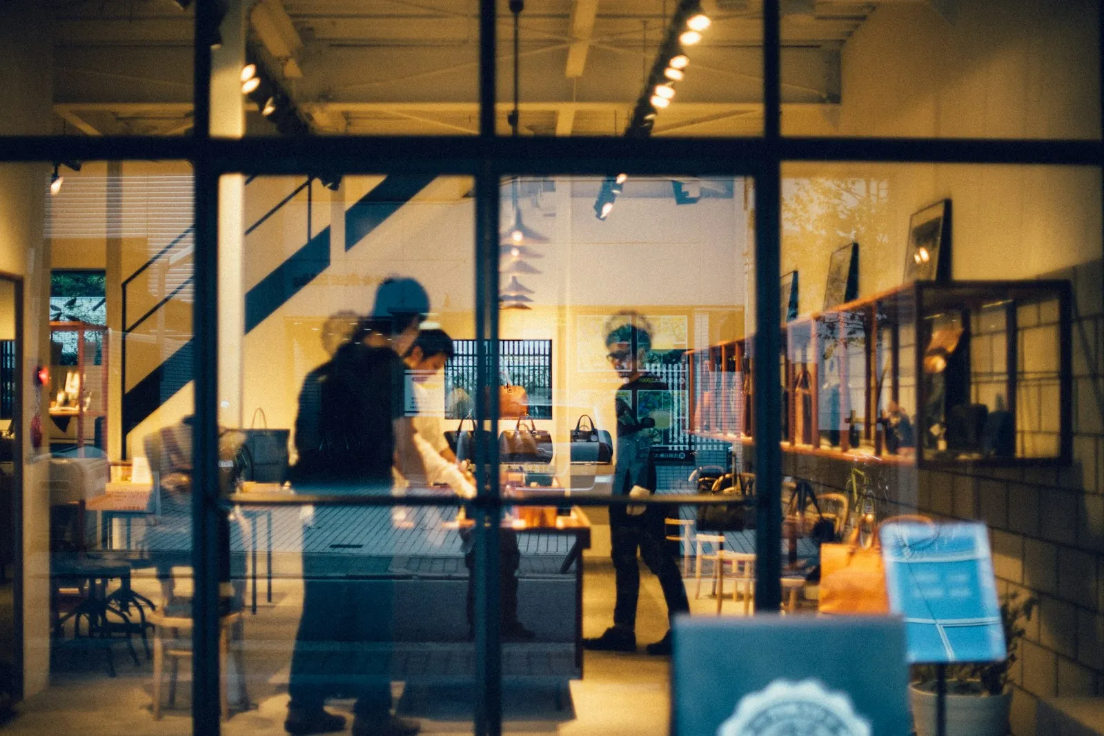 Multi-location business owner comparing performance across stores
