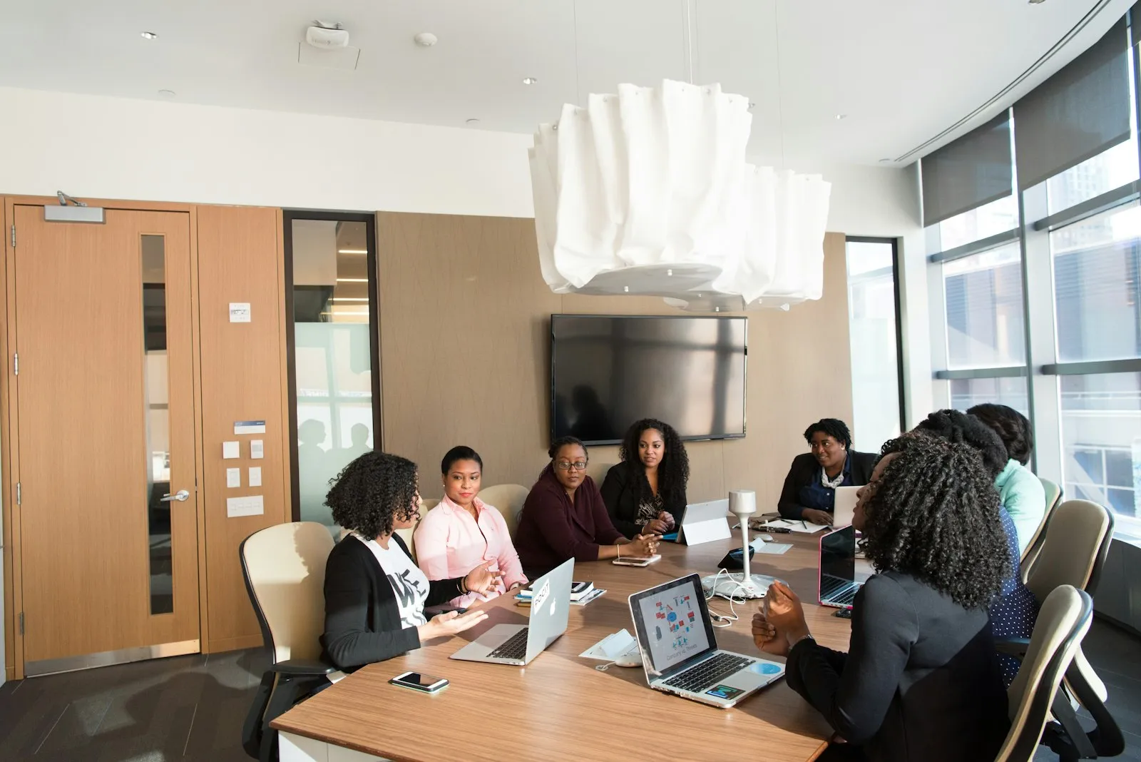 Nonprofit executive director reviewing grant and fund reports