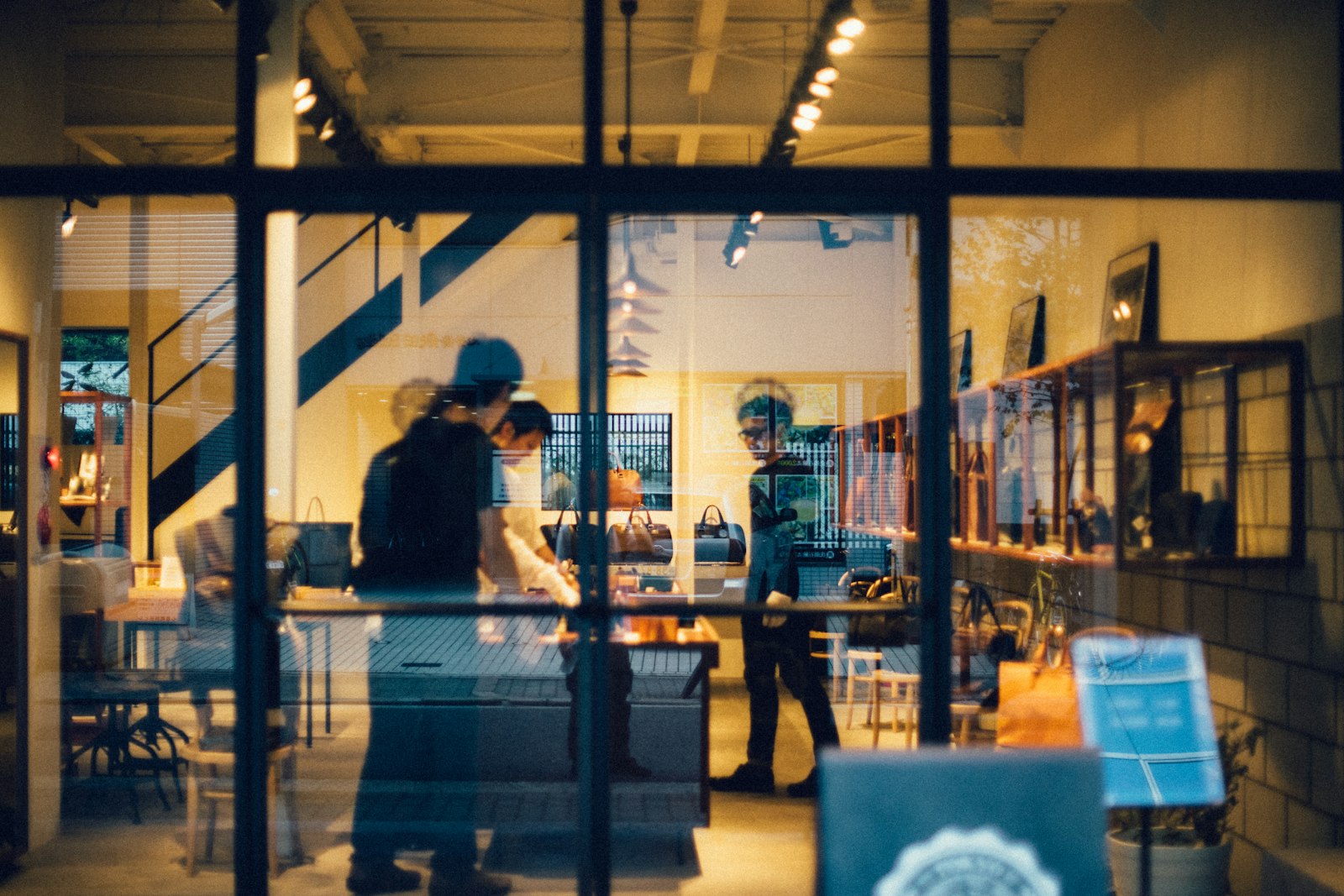 Multi-location business owner comparing performance across stores